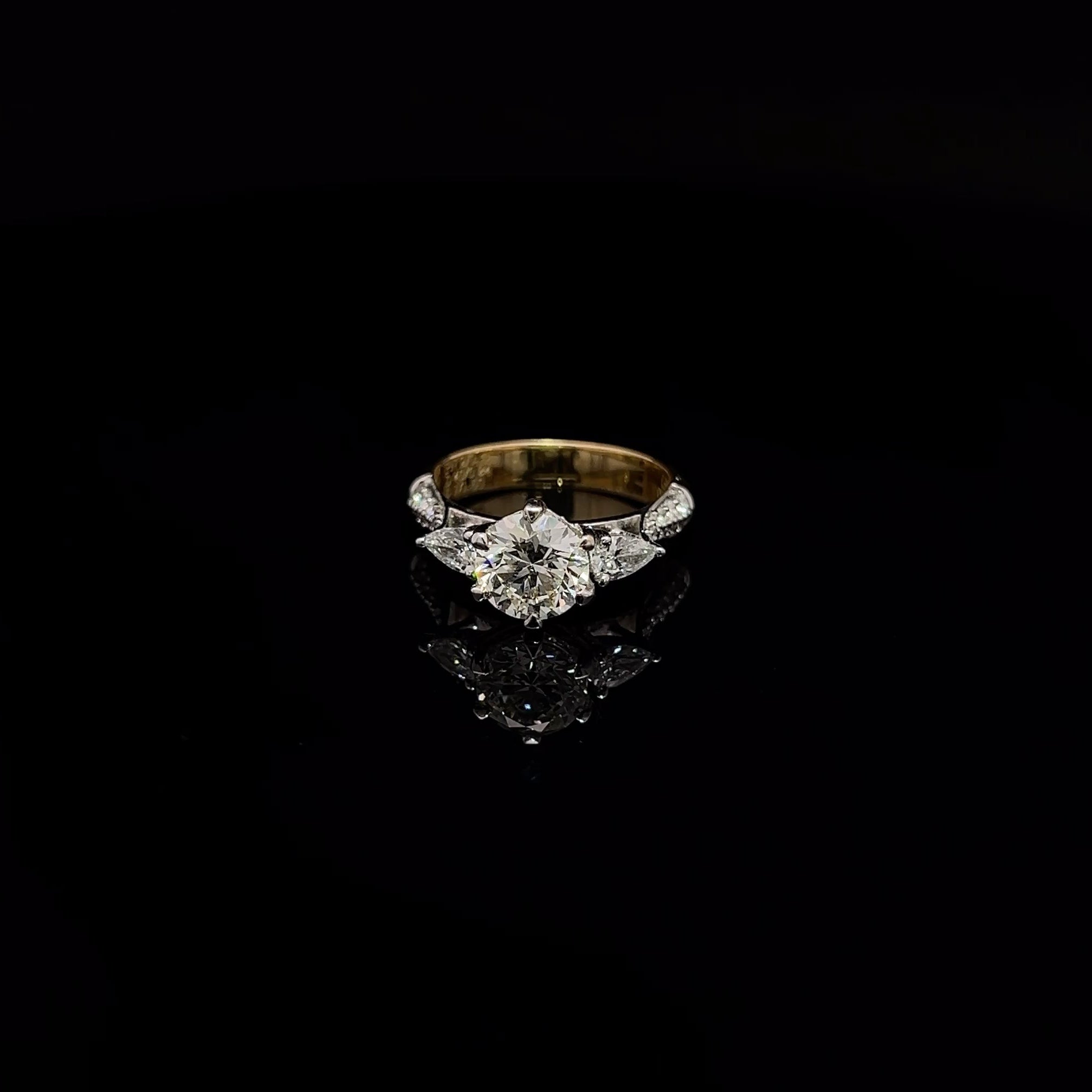 The Pear-Accent Diamond Solitaire Ring